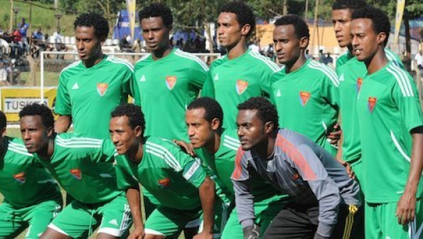 Eritrean national football team players pose on December 1, 2012 before a match against the Rwandan national team during the Council for East and Central Africa Football Associations (CECAFA) tournament at the Namboole International Stadium in Kampala. Ugandan officials said on December 3 that Eritrea's team had disappeared in Uganda in what would be potentially the fourth team to abscond from their authoritarian country. Ugandan police were alerted after 16 football team members disappeared after losing to Rwanda 2-0 in the CECAFA tournament.     AFP PHOTO / STRINGER        (Photo credit should read -/AFP/Getty Images)