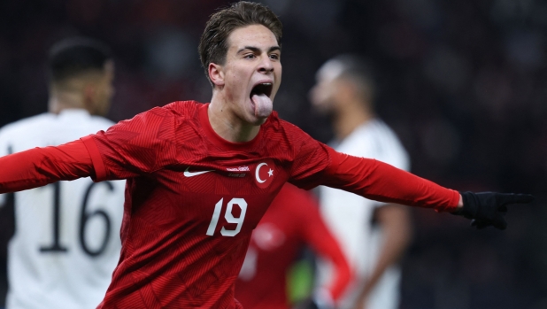 Turkey's forward #19 Kenan Yildiz celebrates scoring during the international friendly football match between Germany and Turkey at the Olympic Stadium in Berlin on November 18, 2023, in preparation for the UEFA Euro 2024 in Germany. (Photo by Ronny HARTMANN / AFP)