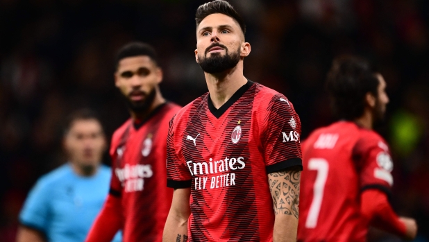 AC Milan's French forward #09 Olivier Giroud reacts during the UEFA Champions League Group F football match between AC Milan and Borussia Dortmund at the San Siro stadium in Milan on November 28, 2023. (Photo by Marco BERTORELLO / AFP)