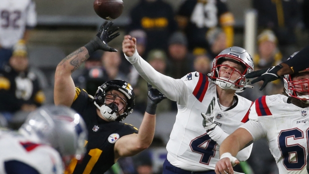 PITTSBURGH, PENNSYLVANIA - DECEMBER 07: Quarterback Bailey Zappe #4 of the New England Patriots throws a pass in the first half against the Pittsburgh Steelers at Acrisure Stadium on December 07, 2023 in Pittsburgh, Pennsylvania.   Justin K. Aller/Getty Images/AFP (Photo by Justin K. Aller / GETTY IMAGES NORTH AMERICA / Getty Images via AFP)