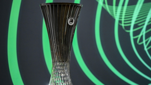 This photograph taken on December 18, 2023, shows the UEFA Europa Conference League cup before the draw for the play-offs in the knockout phase of the 2023-2024 UEFA Europa Conference League football tournament at the House of European Football in Nyon. (Photo by Fabrice COFFRINI / AFP)