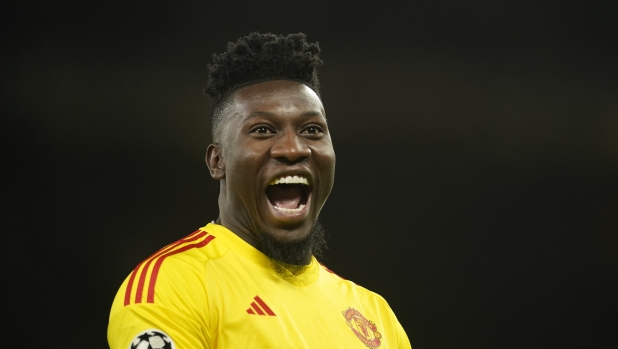 Manchester United's goalkeeper Andre Onana reacts during the Champions League group A soccer match between Manchester United and Galatasaray at the Old Trafford stadium in Manchester, England, Tuesday, Oct. 3, 2023. (AP Photo/Dave Thompson)