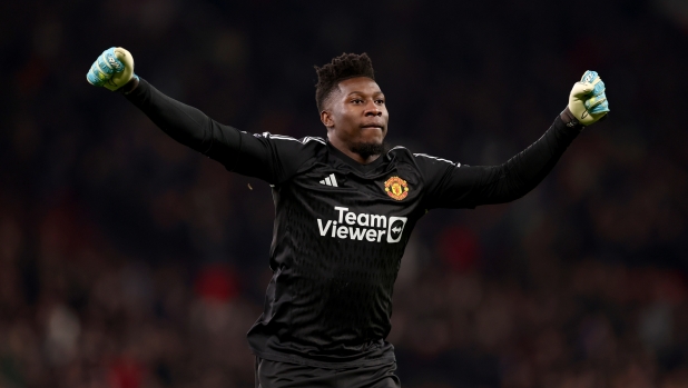 MANCHESTER, ENGLAND - DECEMBER 26: Andre Onana of Manchester United celebrates his team mates third side goal during the Premier League match between Manchester United and Aston Villa at Old Trafford on December 26, 2023 in Manchester, England. (Photo by Naomi Baker/Getty Images)
