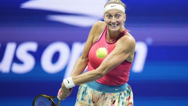 FILE - Petra Kvitova, of the Czech Republic, returns a shot during the second round of the U.S. Open tennis championships, on Aug. 30, 2023, in New York. Two-time Wimbledon champion Petra Kvitova says she?s been pregnant and expecting a baby with her husband Jiri Vanek in the summer. (AP Photo/Frank Franklin II)