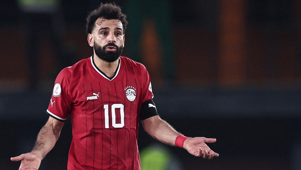 Egypt's forward #10 Mohamed Salah (C) celebrates scoring his team's second goal after a penalty kick during the Africa Cup of Nations (CAN) 2024 group B football match between Egypt and Mozambique at the Felix Houphouet-Boigny Stadium in Abidjan on January 14, 2024. (Photo by FRANCK FIFE / AFP)
