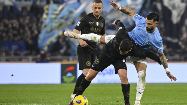 Napoli's Diego Demme (L) in action against LazioÕs Taty Castellanos (R) during the Serie A soccer match between SS Lazio and SSC Napoli at the Olimpico stadium in Rome, Italy, 28 January 2024. ANSA/RICCARDO ANTIMIANI