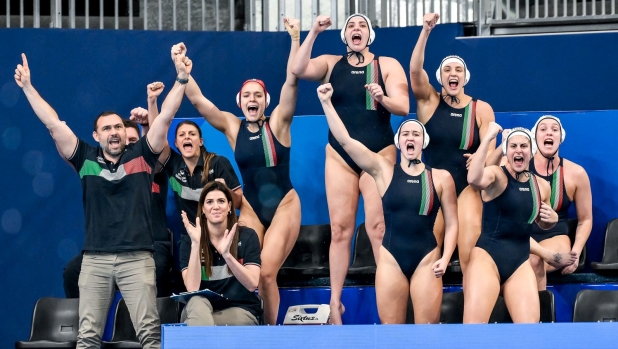 Athletes of Team Italy cheers during the water polo women match between team Italy (white caps) and team Canada (blue caps) of the 21st World Aquatics Championships at the Aspire Dome in Doha (Qatar), February 8, 2024.