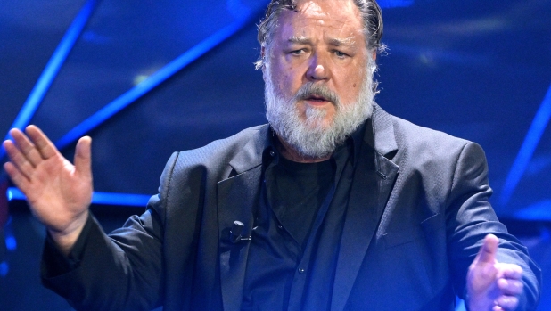 Australian actor Russell Crowe performs on stage at the Ariston theatre during the 74th Sanremo Italian Song Festival, in Sanremo, Italy, 08 February 2024. The music festival will run from 06 to 10 February 2024.  ANSA/ETTORE FERRARI