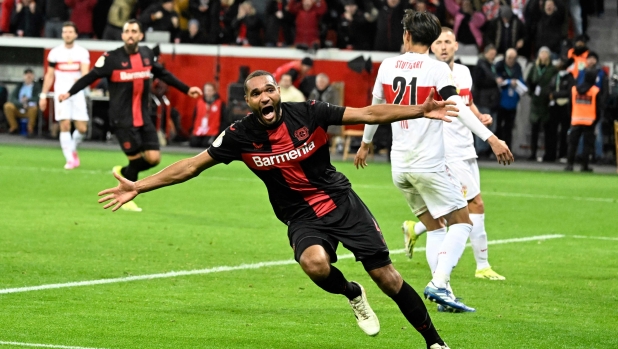 Bayer Leverkusen's German defender #04 Jonathan Tah celebrates scoring the 3-2 winning goal during the German Cup (DFB Pokal) quarter-final football match between Bayer 04 Leverkusen and VfB Stuttgart in Leverkusen, western Germany on February 6, 2024. (Photo by Roberto Pfeil / AFP) / DFB REGULATIONS PROHIBIT ANY USE OF PHOTOGRAPHS AS IMAGE SEQUENCES AND QUASI-VIDEO.