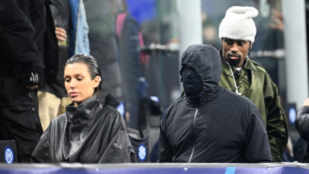 MILAN, ITALY - FEBRUARY 20: Bianca Censori and Kanye West are seen during the UEFA Champions League 2023/24 round of 16 first leg match between FC Internazionale and Atletico Madrid at Stadio Giuseppe Meazza on February 20, 2024 in Milan, Italy. (Photo by Mattia Ozbot - Inter/Inter via Getty Images)