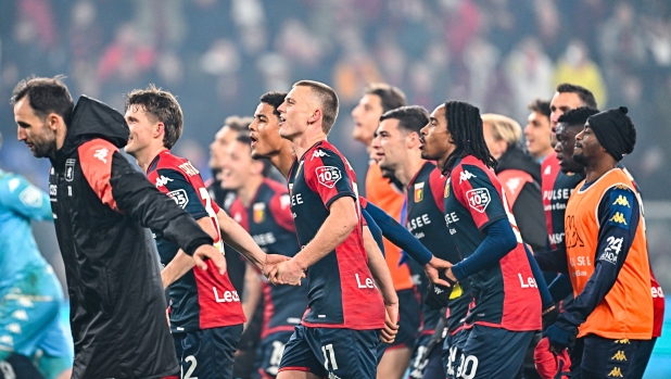 GENOA, ITALY - FEBRUARY 24: Players of Genoa celebrate after the Serie A TIM match between Genoa CFC and Udinese Calcio at Stadio Luigi Ferraris on February 24, 2024 in Genoa, Italy. (Photo by Simone Arveda/Getty Images)