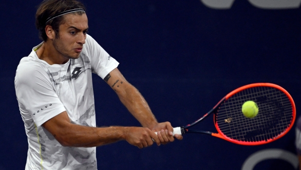 Italy's Flavio Cobolli returns the ball to Japan's Yoshihito Nishioka during the Mexico ATP Open 250 men's singles tennis match at the Cabo Sports Complex in Los Cabos, Baja California, Mexico, on February 20, 2024. (Photo by ALFREDO ESTRELLA / AFP)