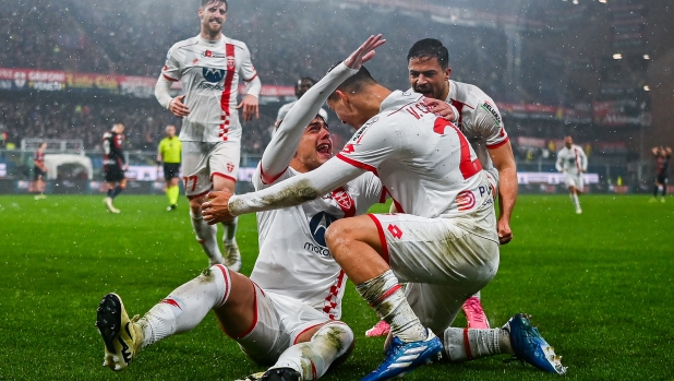 GENOA, ITALY - MARCH 9: Daniel Maldini of Monza (2nd from left) celebrates with his team-mates after scoring a goal during the Serie A TIM match between Genoa CFC and AC Monza at Stadio Luigi Ferraris on March 9, 2024 in Genoa, Italy. (Photo by Simone Arveda/Getty Images)