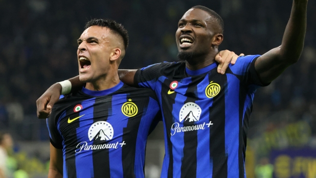 Inter MilanÂ?s Marcus Thuram (R)  jubilates with his teammate Lautaro Martinez after scoring goal of 1 to 0 during the Italian serie A soccer match between Fc Inter  and Roma Giuseppe Meazza stadium in Milan, 29 October 2023.
ANSA / MATTEO BAZZI