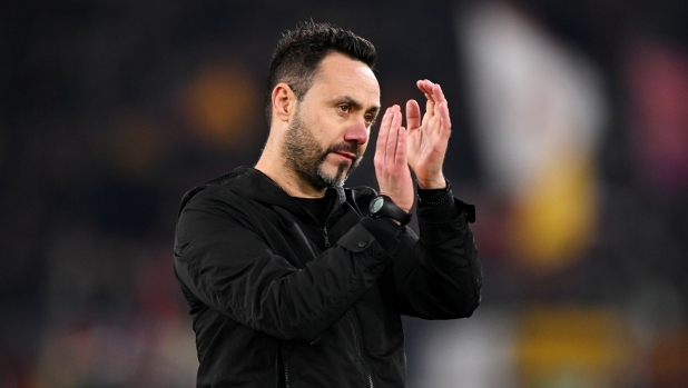 ROME, ITALY - MARCH 07: Roberto De Zerbi, Manager of Brighton & Hove Albion, applauds the fans at full-time following the team's defeat in the UEFA Europa League 2023/24 round of 16 first leg match between AS Roma and Brighton & Hove Albion at Stadio Olimpico on March 07, 2024 in Rome, Italy. (Photo by Mike Hewitt/Getty Images)
