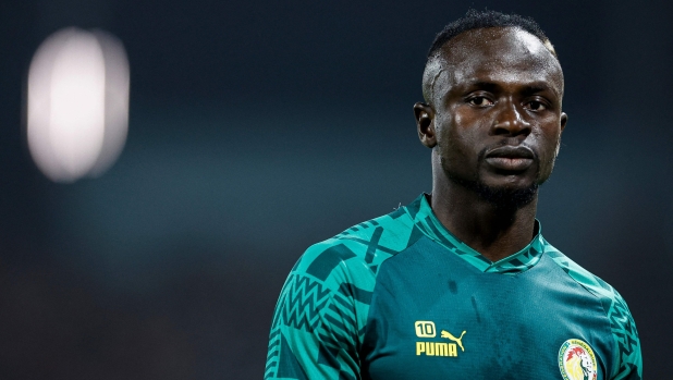 Senegal's midfielder #10 Sadio Mane looks on during a warmup session ahead of the Africa Cup of Nations (CAN) 2024 round of 16 football match between Senegal and Ivory Coast at the Stade Charles Konan Banny in Yamoussoukro on January 29, 2024. (Photo by KENZO TRIBOUILLARD / AFP)