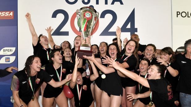 Sis Roma players celebrate the victory at the end of the women water polo Italy Cup 1st and 2nd place final match between Sis Roma (white) and CS Plebiscito Padova  (black) at Centro Federale of Ostia in Rome (Italy), April 7th, 2024.