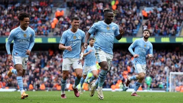 MANCHESTER, ENGLAND - APRIL 13: Jeremy Doku of Manchester City celebrates scoring his team's fourth goal during the Premier League match between Manchester City and Luton Town at Etihad Stadium on April 13, 2024 in Manchester, England. (Photo by Alex Livesey/Getty Images) (Photo by Alex Livesey/Getty Images)