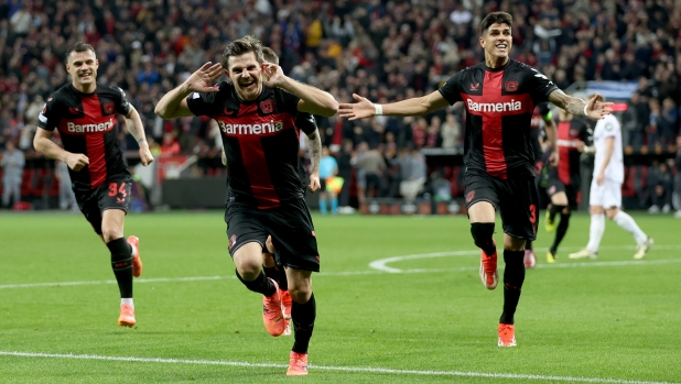 LEVERKUSEN, GERMANY - APRIL 11: Jonas Hofmann of Bayer Leverkusen celebrates with team mates after scoring his teams first goal during the UEFA Europa League 2023/24 Quarter-Final first leg match between Bayer 04 Leverkusen and West Ham United FC at BayArena on April 11, 2024 in Leverkusen, Germany. (Photo by Lars Baron/Getty Images) (Photo by Lars Baron/Getty Images)