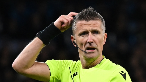 Referee Daniele Orsato reacts during the UEFA Champions League quarter-final second-leg football match between Manchester City and Real Madrid, at the Etihad Stadium, in Manchester, north-west England, on April 17, 2024. (Photo by Paul ELLIS / AFP)