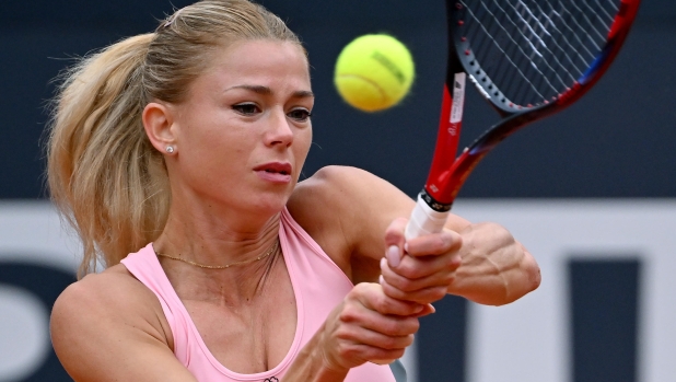 Camila Giorgi of Italy in action during her women's singles third round match against Karolina Muchova of Czech Republic (not pictured) at the Italian Open tennis tournament in Rome, Italy, 14 May 2023.  ANSA/ETTORE FERRARI