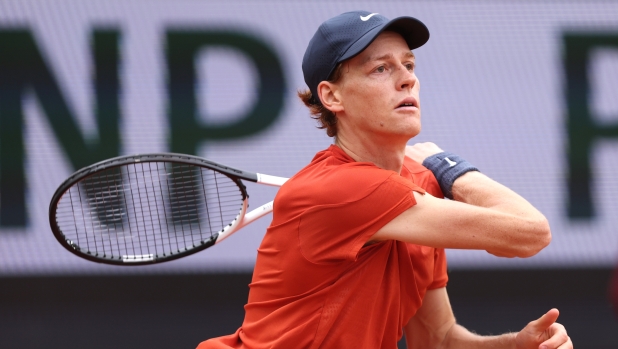 PARIS, FRANCE - MAY 27: Jannik Sinner of Italy plays a forehand against Christopher Eubanks of United States in the Men's Singles first round match  on Day Two of the 2024 French Open at Roland Garros on May 27, 2024 in Paris, France. (Photo by Dan Istitene/Getty Images)