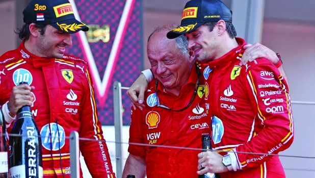MONTE-CARLO, MONACO - MAY 26: Race winner Charles Leclerc of Monaco and Ferrari, Third placed Carlos Sainz of Spain and Ferrari and Ferrari Team Principal Frederic Vasseur celebrate on the podium during the F1 Grand Prix of Monaco at Circuit de Monaco on May 26, 2024 in Monte-Carlo, Monaco. (Photo by Ryan Pierse/Getty Images)