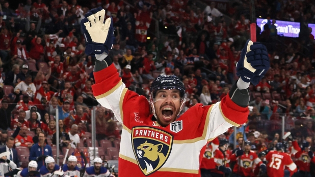 SUNRISE, FLORIDA - JUNE 10: Evan Rodrigues #17 of the Florida Panthers celebrates after scoring a goal against the Edmonton Oilers during the third period in Game Two of the 2024 Stanley Cup Final at Amerant Bank Arena on June 10, 2024 in Sunrise, Florida.   Bruce Bennett/Getty Images/AFP (Photo by BRUCE BENNETT / GETTY IMAGES NORTH AMERICA / Getty Images via AFP)
