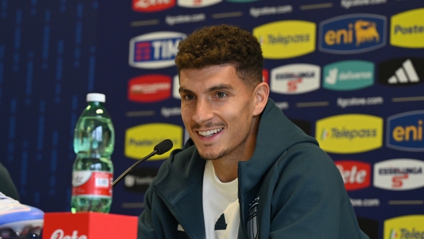 ISERLOHN, GERMANY - JUNE 12: Giovanni Di Lorenzo of Italy speaks with the media during Italy press conference at Hemberg-Stadion on June 12, 2024 in Iserlohn, Germany. (Photo by Claudio Villa/Getty Images for FIGC)