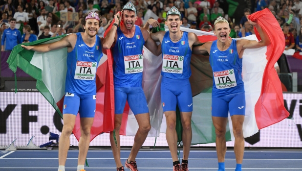 ROME, ITALY - JUNE 12: Gold medalists Luca Sito, Vladimir Aceti, Riccardo Meli and Edoardo Scotti of Team Italy celebrate winning the Men's 4x400m Final on day six of the 26th European Athletics Championships - Rome 2024 at Stadio Olimpico on June 12, 2024 in Rome, Italy.  (Photo by David Ramos/Getty Images)