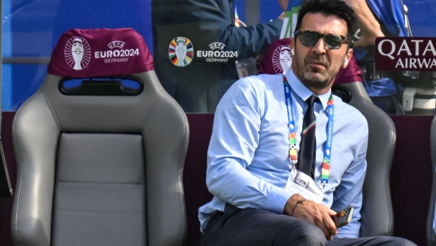 Former Italian international football player and Italy's delegation head Gianluigi Buffon looks on prior the UEFA Euro 2024 round of 16 football match between Switzerland and Italy at the Olympiastadion Berlin in Berlin on June 29, 2024. (Photo by Fabrice COFFRINI / AFP)