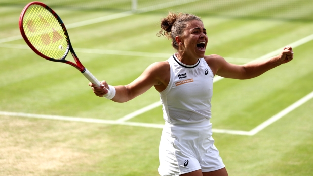 LONDON, ENGLAND - JULY 11: Jasmine Paolini of Italy celebrates winning match point as she plays against Donna Vekic of Croatia in the Ladies' Singles Semi-Final match during day eleven of The Championships Wimbledon 2024 at All England Lawn Tennis and Croquet Club on July 11, 2024 in London, England. (Photo by Francois Nel/Getty Images)