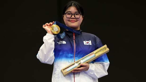 CHATEAUROUX, FRANCE - JULY 28: Gold medalist Oh Ye Jin of Team Republic of Korea poses on the podium during the Women's 10m Air Pistol Final medal ceremony on day two of the Olympic Games Paris 2024 at Chateauroux Shooting Centre on July 28, 2024 in Chateauroux, France. (Photo by Charles McQuillan/Getty Images)