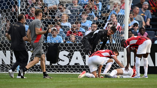 NEW YORK, NEW YORK - JULY 27: Alessandro Florenzi of AC Milan lays on the pitch injured during a Pre-Season Friendly match between Manchester City and AC Milan at Yankee Stadium on July 27, 2024 in New York City.   Drew Hallowell/Getty Images/AFP (Photo by Drew Hallowell / GETTY IMAGES NORTH AMERICA / Getty Images via AFP)