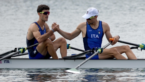 epa11511907 Stefano Oppo and Gabriel Soares of Italy celebrate after winning their race in the Lightweight Men's Double Sculls semifinals A/B of the Rowing competitions in the Paris 2024 Olympic Games, at the Vaires-sur-Marne Nautical Stadium in Vaires-sur-Marne, France, 31 July 2024.  EPA/MAXIM SHIPENKOV