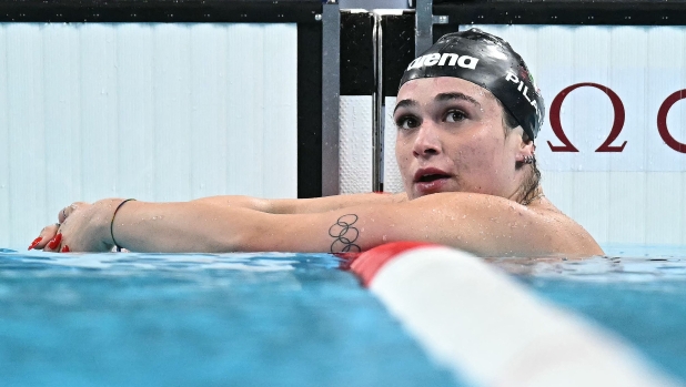 Italy's Benedetta Pilato reacts after competing in a semifinal of the men's 200m freestyle swimming event during the Paris 2024 Olympic Games at the Paris La Defense Arena in Nanterre, west of Paris, on July 28, 2024. (Photo by Manan VATSYAYANA / AFP)