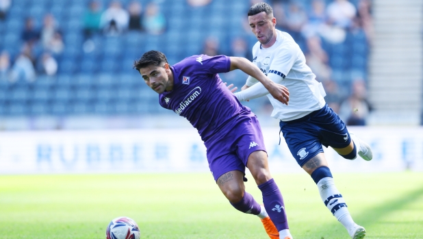 PRESTON, ENGLAND - JULY 27: Riccardo Sottil of ACF Fiorentina with the ball whilst under pressure during the pre-season friendly match between Preston North End and ACF Fiorentina at Deepdale on July 27, 2024 in Preston, England. (Photo by Ben Roberts Photo/Getty Images)