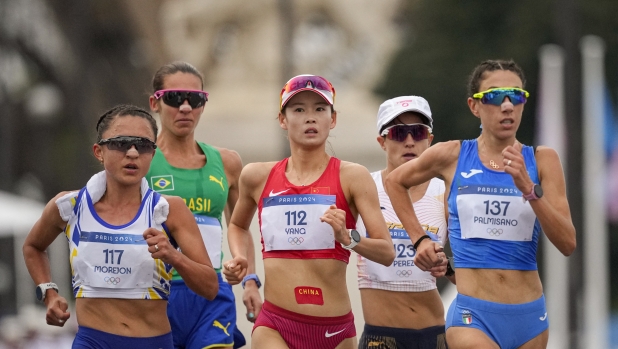 Glenda Morejon, of Ecuador, (117), China\'s Yang Jiayu (112) and Italy\'s Antonella Palmisano (137) compete during the marathon race walk relay mixed at the 2024 Summer Olympics, Wednesday, Aug. 7, 2024, in Paris, France. (AP Photo/Dar Yasin)    Associated Press / LaPresse Only italy and Spain