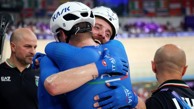 PARIS, FRANCE - AUGUST 10: (L-R) Silver medalists Elia Viviani and Simone Consonni of Team Italy celebrate after Men's Madison Final on day fifteen of the Olympic Games Paris 2024 at Saint-Quentin-en-Yvelines Velodrome on August 10, 2024 in Paris, France. (Photo by Jared C. Tilton/Getty Images)