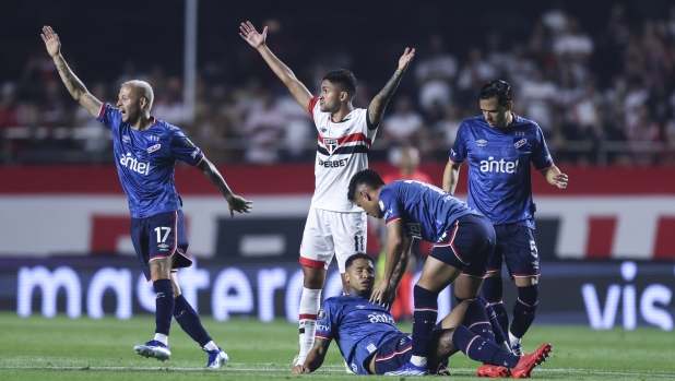 FILE: In The News: Juan Izquierdo Dies At 27 - According to Nacional, Juan passed away on August 27, 2024 after fainting in the Copa CONMEBOL Libertadores 2024 Round of 16 second leg match between Sao Paulo and Nacional. SAO PAULO, BRAZIL - AUGUST 22: Juan Izquierdo of Nacional faints during a Copa CONMEBOL Libertadores 2024 Round of 16 second leg match between Sao Paulo and Nacional at MorumBIS on August 22, 2024 in Sao Paulo, Brazil.  (Photo by Alexandre Schneider/Getty Images)