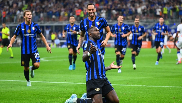 MILAN, ITALY - AUGUST 30: Marcus Thuram of FC Internazionale celebrates after scoring the fourth goal during the Serie match between FC Internazionale and Atalanta at Stadio Giuseppe Meazza on August 30, 2024 in Milan, Italy. (Photo by Mattia Pistoia - Inter/Inter via Getty Images)