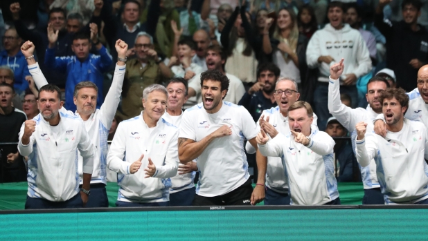 Italian team celebrates during the tennis Davis Cup final 8 match between Flavio Cobolli (Italy) and Zizou Bergs (Belgium) at the Unipol arena, Casalecchio (Bologna), Bologna, northern Italy, Friday, September 13, 2024. Sport - Tennis - (Photo Michele Nucci - LaPresse)