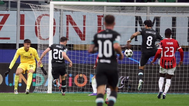 Liverpools Dominik Szoboszlai (second from R) scores goal of 1 to 3 against AC Milans goalkeeper  Lorenzo Torriani (L) during the UEFA Champions League soccer match between Ac Milan and  Liverpool at Giuseppe Meazza stadium in Milan, 17 September  2024.
ANSA / MATTEO BAZZI