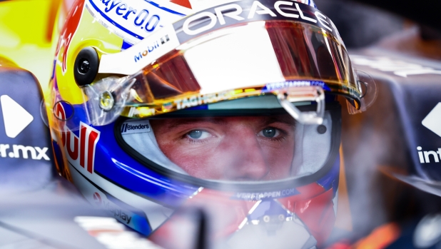 SINGAPORE, SINGAPORE - SEPTEMBER 20: Max Verstappen of the Netherlands and Oracle Red Bull Racing prepares to drive in the garage during practice ahead of the F1 Grand Prix of Singapore at Marina Bay Street Circuit on September 20, 2024 in Singapore, Singapore. (Photo by Mark Thompson/Getty Images)