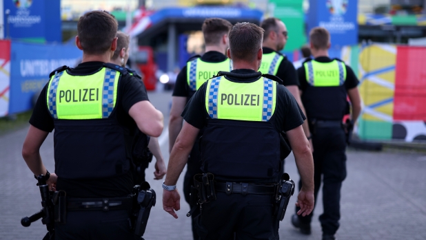 HAMBURG, GERMANY - JUNE 26: Polizei (Police) patrol the outside of the stadium prior to the UEFA EURO 2024 group stage match between Czechia and Turkiye at Volksparkstadion on June 26, 2024 in Hamburg, Germany. (Photo by Alex Livesey/Getty Images)