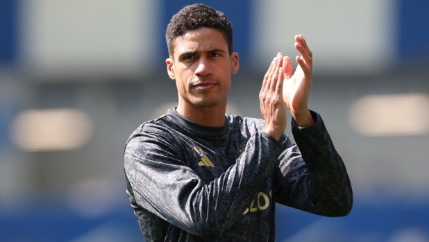 BRIGHTON, ENGLAND - MAY 19: Raphael Varane of Manchester United applauds the fans during the warm up prior to the Premier League match between Brighton & Hove Albion and Manchester United at American Express Community Stadium on May 19, 2024 in Brighton, England. (Photo by Michael Steele/Getty Images)