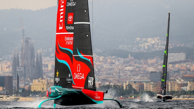 BARCELONA, SPAIN - OCTOBER 14: The crew of both boats compete during the race between Emirates Team New Zealand and Team Ineos Britannia in the race 4th of the 37th America's Cup on October 14, 2024 in Barcelona, Spain. (Photo by David Ramos/Getty Images)