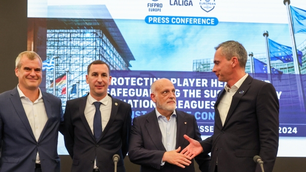 epa11658599 From L - Mathieu Moreuil, director of International Football Relations & EU Affairs at the Premier League, FIFPRO Europe president David Terrier, Spanish LaLiga president Javier Tebas, and Belgian Pro League CEO Lorin Parys at the end of a press conference in Brussels, Belgium, 14 October 2024. European Leagues, FIFPRO Europe and LaLiga on 14 October 2024 filed a formal complaint to the European Commission against FIFA on competition law grounds.  EPA/OLIVIER HOSLET