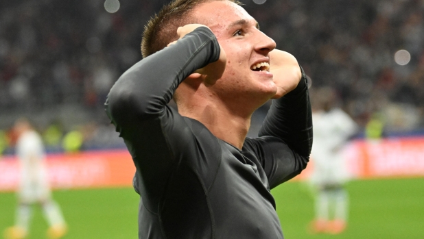 AC Milan's forward Francesco Camarda celebrates after scoring during the UEFA Champions League match between AC Milan and Club Brugge KV at the Giuseppe Meazza Stadium in Milan, Italy, 22 October 2024. ANSA/DANIEL DAL ZENNARO