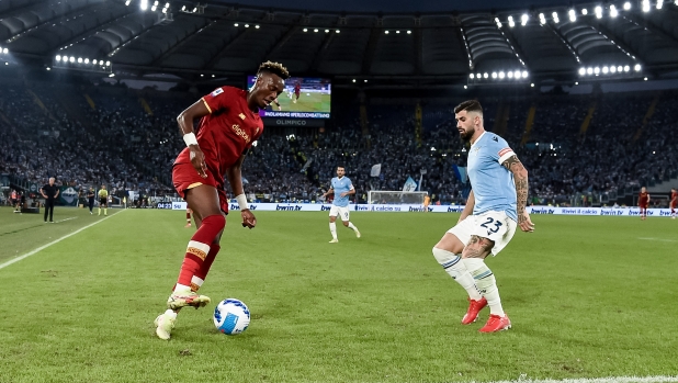 Tammy Abraham of AS Roma and Elseid Hysaj of SS Lazio compete for the ball during the Serie A match between SS Lazio and AS Roma at Stadio Olimpico, Rome, Italy on 26 September 2021.  (Photo by Giuseppe Maffia/NurPhoto) (Photo by Giuseppe Maffia / NurPhoto / NurPhoto via AFP)